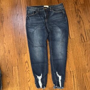 Distressed Blue Skinny Jeans with Tapered Leg